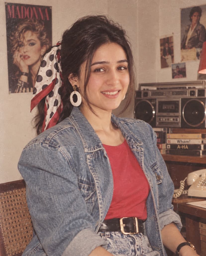 80s-inspired portrait with polka-dot hair scarf and denim